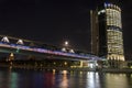 Moscow business center and bridge over river, night scene