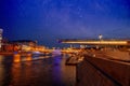 Moscow, the capital of Russia. Night landscape, view of the city center and the river at night. Starry sky over the city Royalty Free Stock Photo