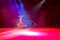 Moscow circus on ice on tour. Actress of troupe presents number Game with hula hoops