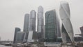 Moscow City skyscrapers in a foggy weather. Action. Amazing and unusual high rise buildings, business life of the