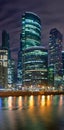 Moscow city skyscrapers and reflection in the Moscow river against the blue sky on a summer night Royalty Free Stock Photo