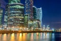 Moscow city skyscrapers and reflection in the Moscow river against the blue sky on a summer night Royalty Free Stock Photo