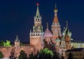 Moscow cityscape with cathedral of Vasily the Blessed Saint Basil`s Cathedral and Spasskaya Tower of Moscow Kremlin on Red Royalty Free Stock Photo