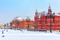 Moscow in cold winter, Russia. Scenery of old historical buildings on the snowy Manezhnaya Square near Moscow Kremlin Royalty Free Stock Photo