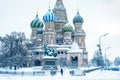 Moscow in cold winter, Russia. St Basil`s cathedral on Red Square during snowfall