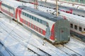 MOSCOW, FEB. 01, 2018: Diagonal winter view on Russian railway passenger train with double deck coaches cars in trains depot under