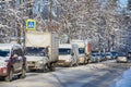 MOSCOW, FEB. 01, 2018: Winter day view on automobiles car in city hard traffic caused by heavy snow in the city. Slow cars traffic