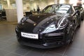 Moscow. February 2018. Black Porsche 911 991 Carrera at dealer showroom. Headlights and aerodynamic turbo packed Front and left Royalty Free Stock Photo