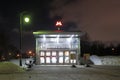 Illuminated entrance to Orekhovo metro station in Moscow with no people. Winter night view.