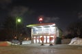 Illuminated entrance to Orekhovo metro station in Moscow with no people. Winter night view.