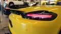 Moscow. February 2019. New yellow Porsche Boxster 718 in service station. Presale preparation and verification