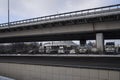 Parking under overhead road close to VDNKh metro station in Moscow, Russia. Cloudy winter view.