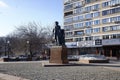 Statue of famous Russian painter Vasily Surikov in Prechistenka street of Moscow, Russia. Sunny spring view.