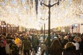 The Ilyinskaya street full of locals and tourists at night.