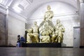 Sculptural composition at the end of the hall of Belorusskaya underground station. Interior view.