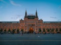 Red square with walking people and GUM with evening lighting Royalty Free Stock Photo