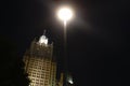 Shining street lamp and building of foreign ministry of Russia in background. Smolenskaya square of Moscow, Russia. Royalty Free Stock Photo