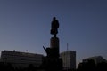 Outline of the monument to Vladimir Ilyich Lenin in Kaluzhskaya square with dark sky in background. Summer sunset view. Royalty Free Stock Photo
