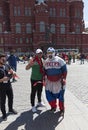 MOSCOW - JUNE 20, 2018: Soccer World Cup Fanatics of Morocco, Russia with flags with their typical costumes in the streets June 20 Royalty Free Stock Photo