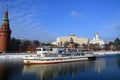 Moscow Kremlin architecture in winter. Cruise ship sails on the river Royalty Free Stock Photo