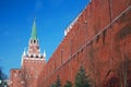 Moscow Kremlin. Color photo. Trinity tower and old wall made of red bricks. Royalty Free Stock Photo