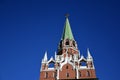 Moscow Kremlin. Color photo. Trinity tower and old wall made of red bricks. Royalty Free Stock Photo