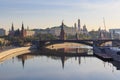 Moscow Kremlin on a Moskva river embankments background. View from Patriarshiy bridge in sunny spring morning Royalty Free Stock Photo