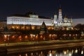 Moscow Kremlin at night on the background of Kremlevskaya embankment Royalty Free Stock Photo