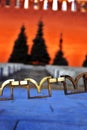 Moscow Kremlin at night. Golden metallic chain made of M-letters