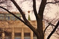 Moscow Kremlin. Red ruby star seen through the trees. Color photo