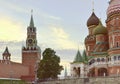 Moscow Kremlin and St. Basil`s Cathedral on red squaree, crosses on domes,