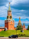 Moscow Kremlin in summer, Russia. Vertical scenic view of Spasskaya Tower and St Basil`s Cathedral