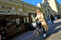 05.24.2019 Moscow. Kuznetsk bridge st. Russia. lady on a bicycle on a city street