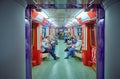 MOSCOW, MAY, 13, 2018: Different people traveling in russian modern subway passenger train. Mass transit metro electric transport.