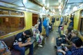 MOSCOW, MAY, 13, 2018: Different people traveling on russian retro subway passenger train. Mass transit metro electric transport.