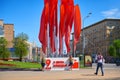 MOSCOW, MAY, 9, 2018: Great Victory day May 9 celebration decoration. Man shooting two young girls in soviet soldiers uniform.