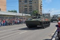 MOSCOW, MAY, 9, 2018: Great Victory holiday parade of Russian military vehicles. Celebrating people, Victory symbols in the backgr