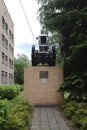 Old soviet field engine STZ-1 as a monument GLORY TO AGRICULTURAL WORKERS in territory of Moscow Timiryazev Agricultural Academy