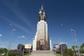 Sculpture monument Worker and female Collective farmer Rabochiy i Kolkhoznitsa with sickle and hammer on museum pavilion roof Royalty Free Stock Photo