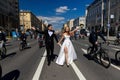 MOSCOW - MAY 21, 2022: Wedding couple during Bicycle parade in the center of Moscow on May 21, 2012, Moscow, Russia