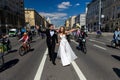 MOSCOW - MAY 21, 2022: Wedding couple during Bicycle parade in the center of Moscow on May 21, 2012, Moscow, Russia