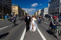 MOSCOW - MAY 21, 2022: Wedding couple during Bicycle parade in the center of Moscow on May 21, 2012, Moscow, Russia