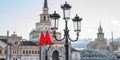 Moscow metro sign and Stalinist architecture on background. Selective focus on Metro sign Royalty Free Stock Photo