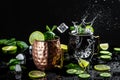 Moscow mule cocktail with lime, mint and cucumber splashes and ice frozen motion Royalty Free Stock Photo
