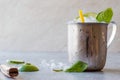 Moscow Mule Cocktail with Lime, Mint Leaves and Crushed Ice in Metal Cup. Royalty Free Stock Photo