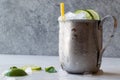 Moscow Mule Cocktail with Lime, Mint Leaves and Crushed Ice in Metal Cup. Royalty Free Stock Photo