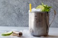 Moscow Mule Cocktail with Lime, Mint Leaves and Crushed Ice in Metal Cup. Royalty Free Stock Photo