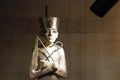 Burial figurine of pharaoh Tutenkhamun with egyptian symbols of authority. Close up view. Royalty Free Stock Photo