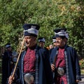 Image of elderly musicians in Turkish national costumes