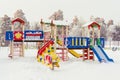 Moscow region, Kolomna, Russia-December 18, 2018: children`s Playground with colored red-blue-yellow wooden houses and slides wit